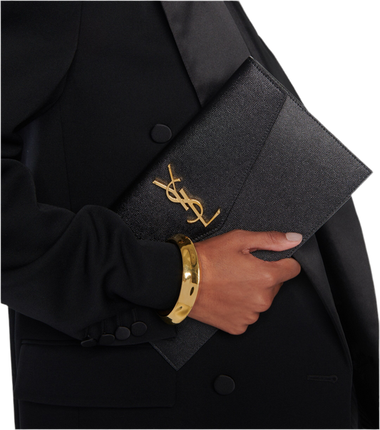 SAINT LAURENT
Uptown patent leather clutch