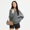 Teri Shoulder Bag
In Signature Canvas
