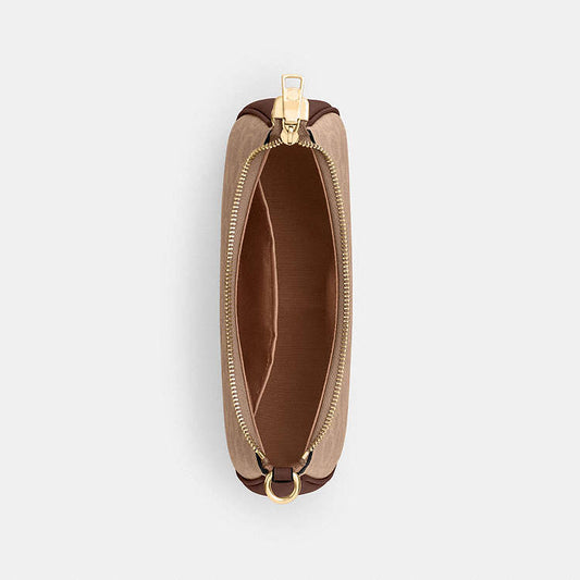 Teri Shoulder Bag
In Signature Canvas