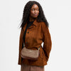 Teri Shoulder Bag
In Signature Canvas
