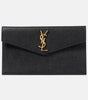 SAINT LAURENT
Uptown patent leather clutch