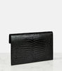 SAINT LAURENT
Uptown patent leather clutch