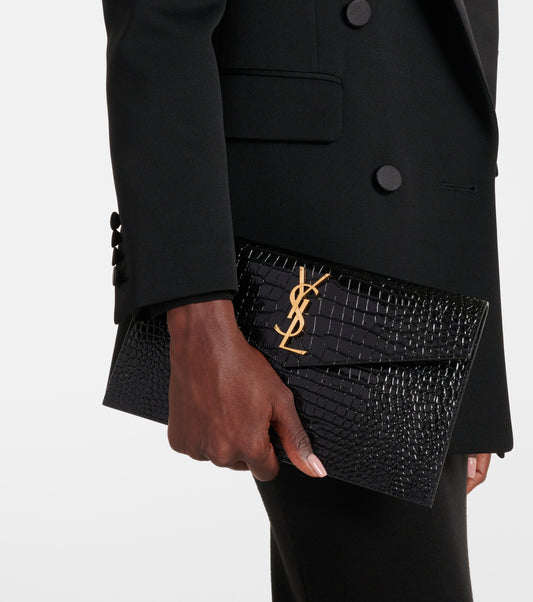 SAINT LAURENT
Uptown patent leather clutch
