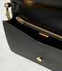 PRADA
Small leather crossbody bag