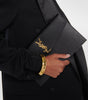 SAINT LAURENT
Uptown patent leather clutch