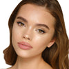 HOLLYWOOD GLOW GLIDE FACE ARCHITECT HIGHLIGHTER CHAMPAGNE GLOW ( sold out)