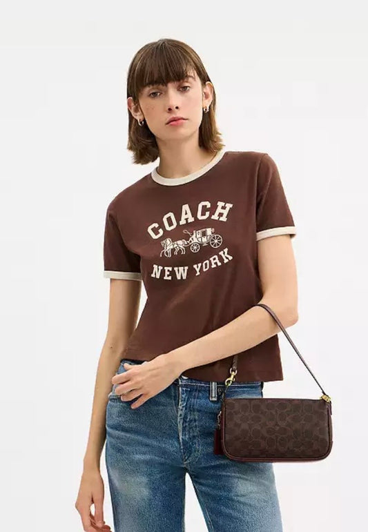 Plaza Bag
In Signature Canvas