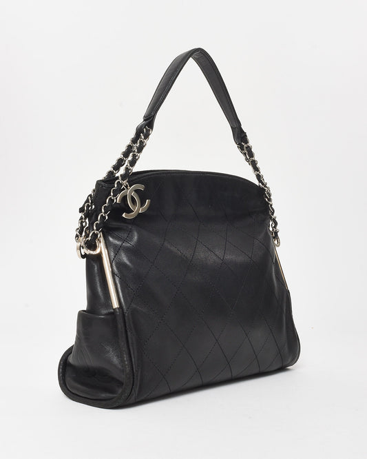 CHANEL
Black Quilted Lambskin Leather Small Ultimate Soft Bag